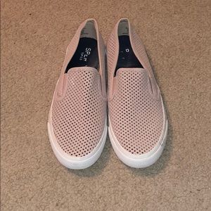 Light pink sperry slip ons.
